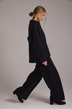 Брюки широкие прорезными карманами вязаные